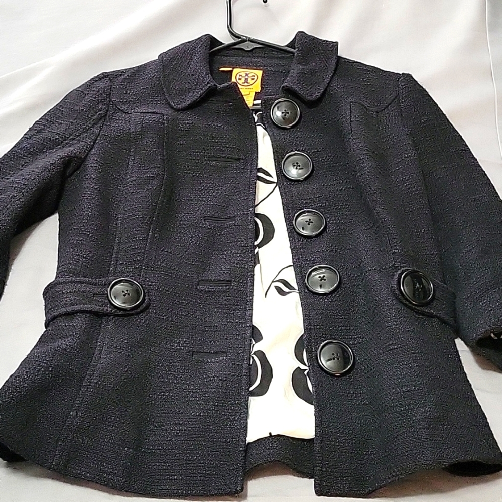 Size 4 Tory Burch black 3/4 length blazer. With black buttons and printed shell.